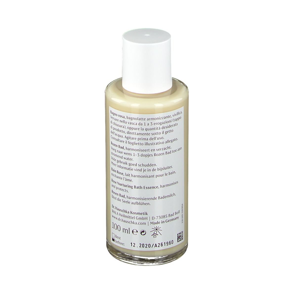 Flacon en verre avec bouchon blanc. Étiquette avec texte et bande rouge. Dos avec texte.