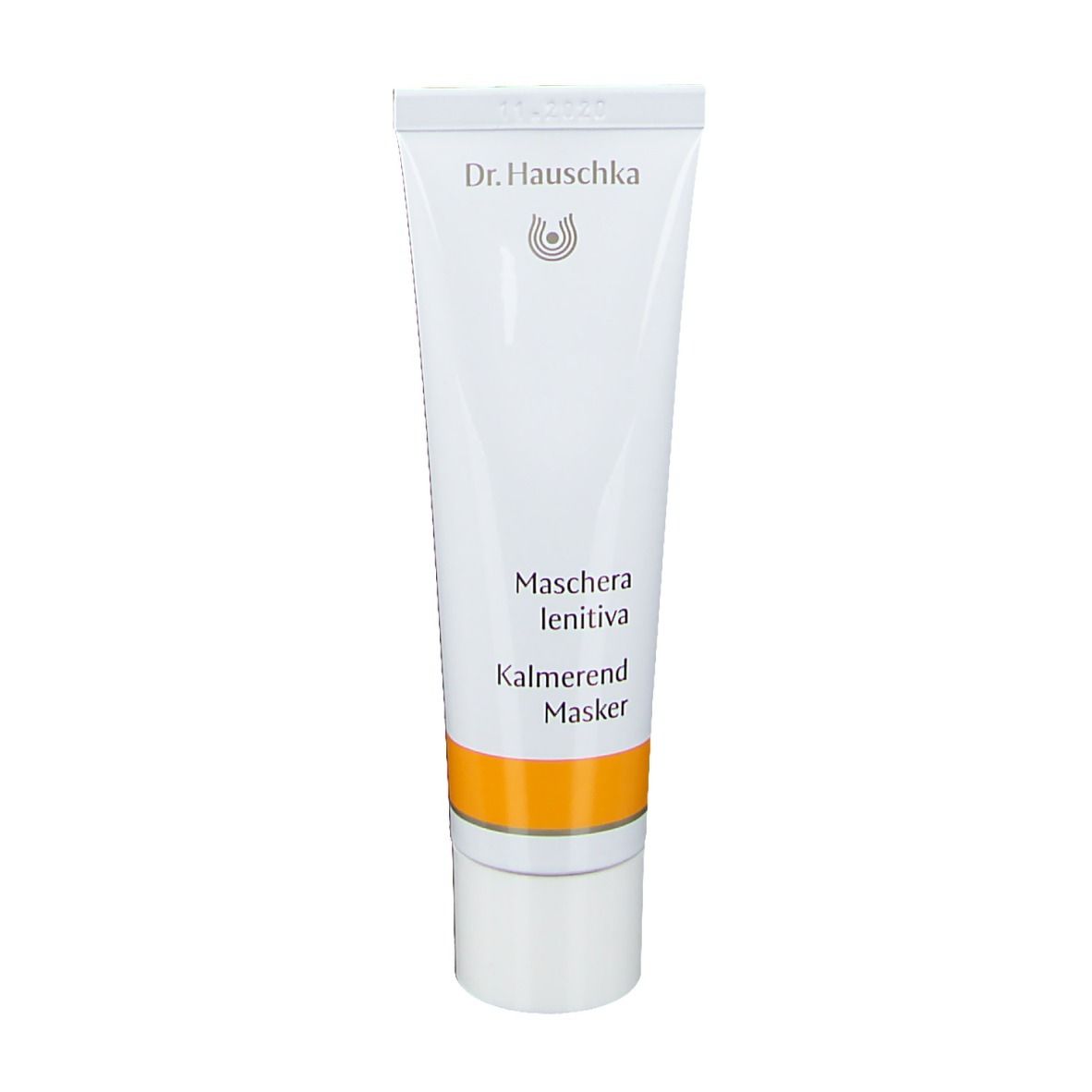Tube blanche avec bande jaune. Inscription: Dr. Hauschka, Maschera lenitiva, Kalmerend Masker.