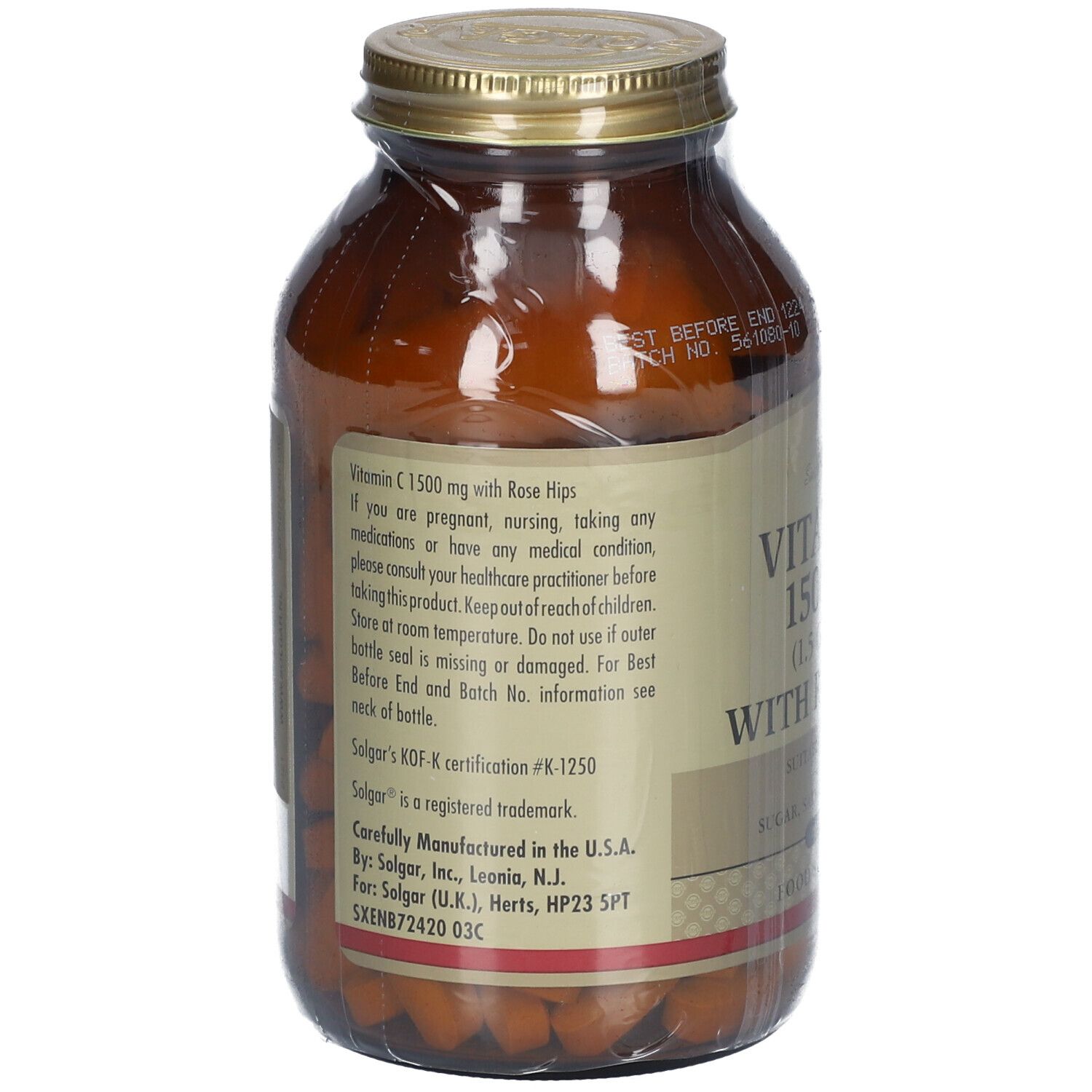 Vue arrière d'un flacon en verre brun. Étiquette: Vitamine C 1500 mg avec cynorrhodon. Informations et avertissements.
