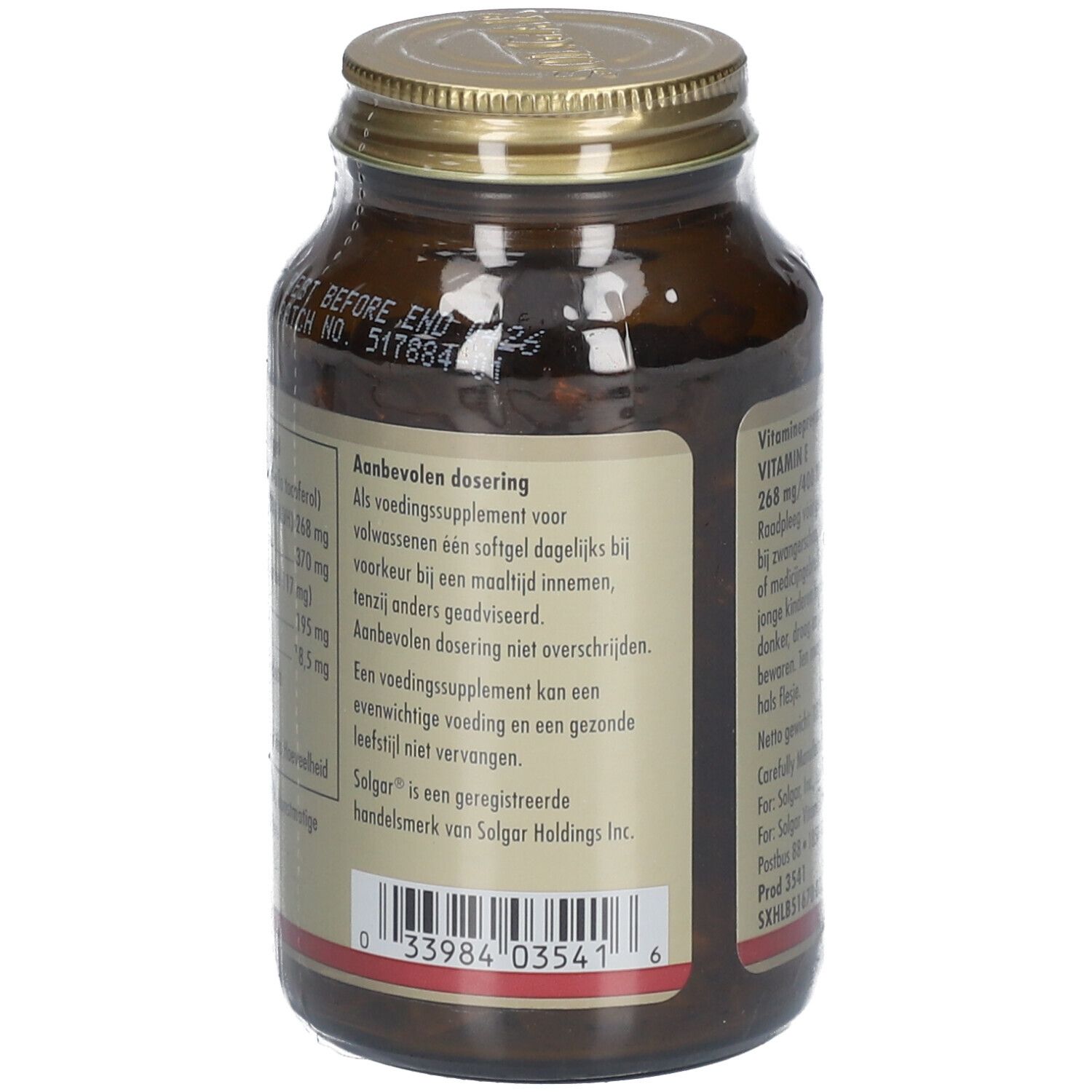 Flacon en verre brun avec bouchon à vis. Étiquette avec informations produit. Étiquette volante avec texte. Inscription: Vitamine E 268 mg/400 UI COMPLEX.