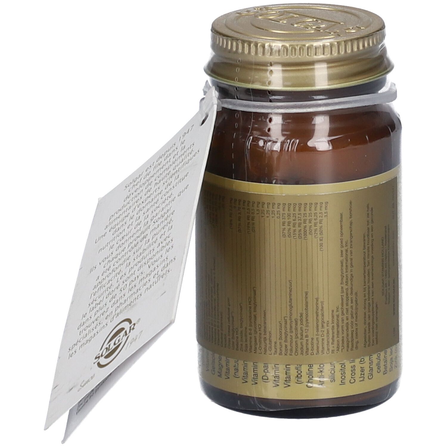 Flacon en verre brun avec couvercle doré. Étiquette avec texte. Étiquette avec texte et logo. Emballage plastique transparent.