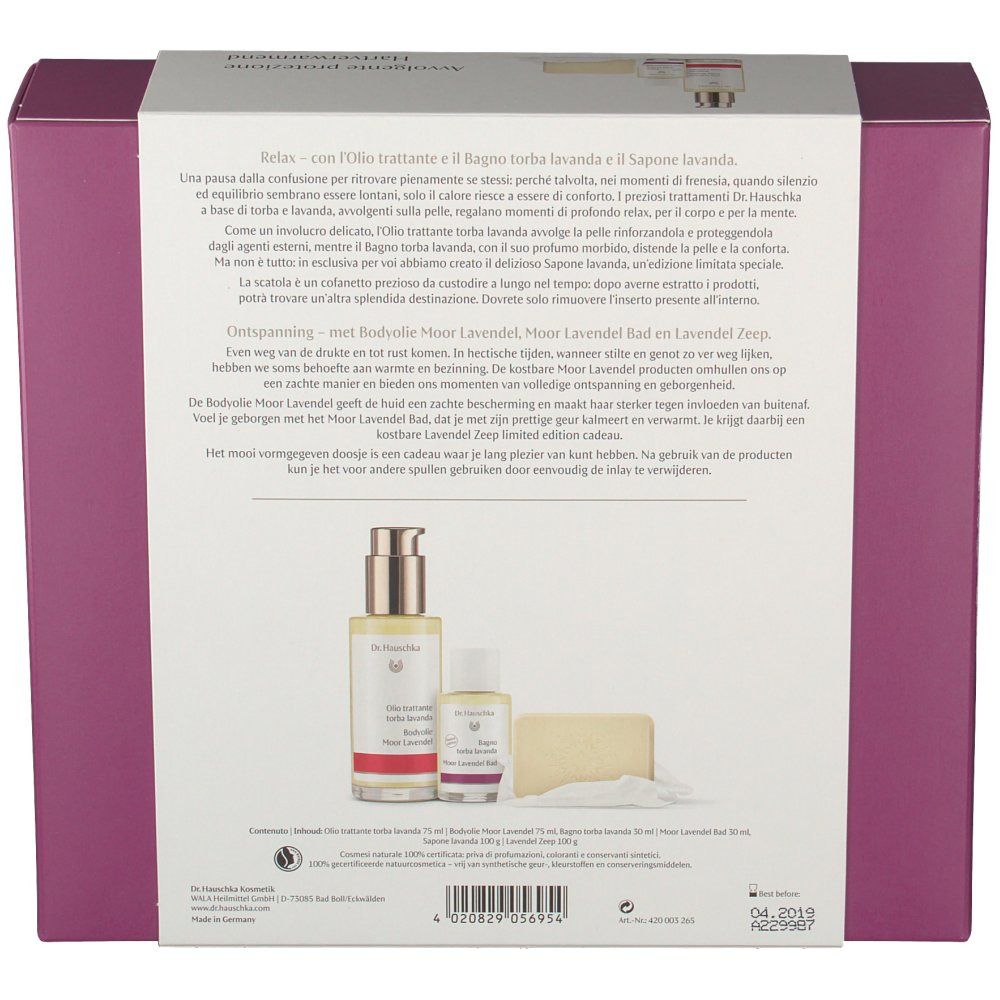 Dos du coffret cadeau Dr. Hauschka. Montre des produits : huile, bain et savon. Texte multilingue.
