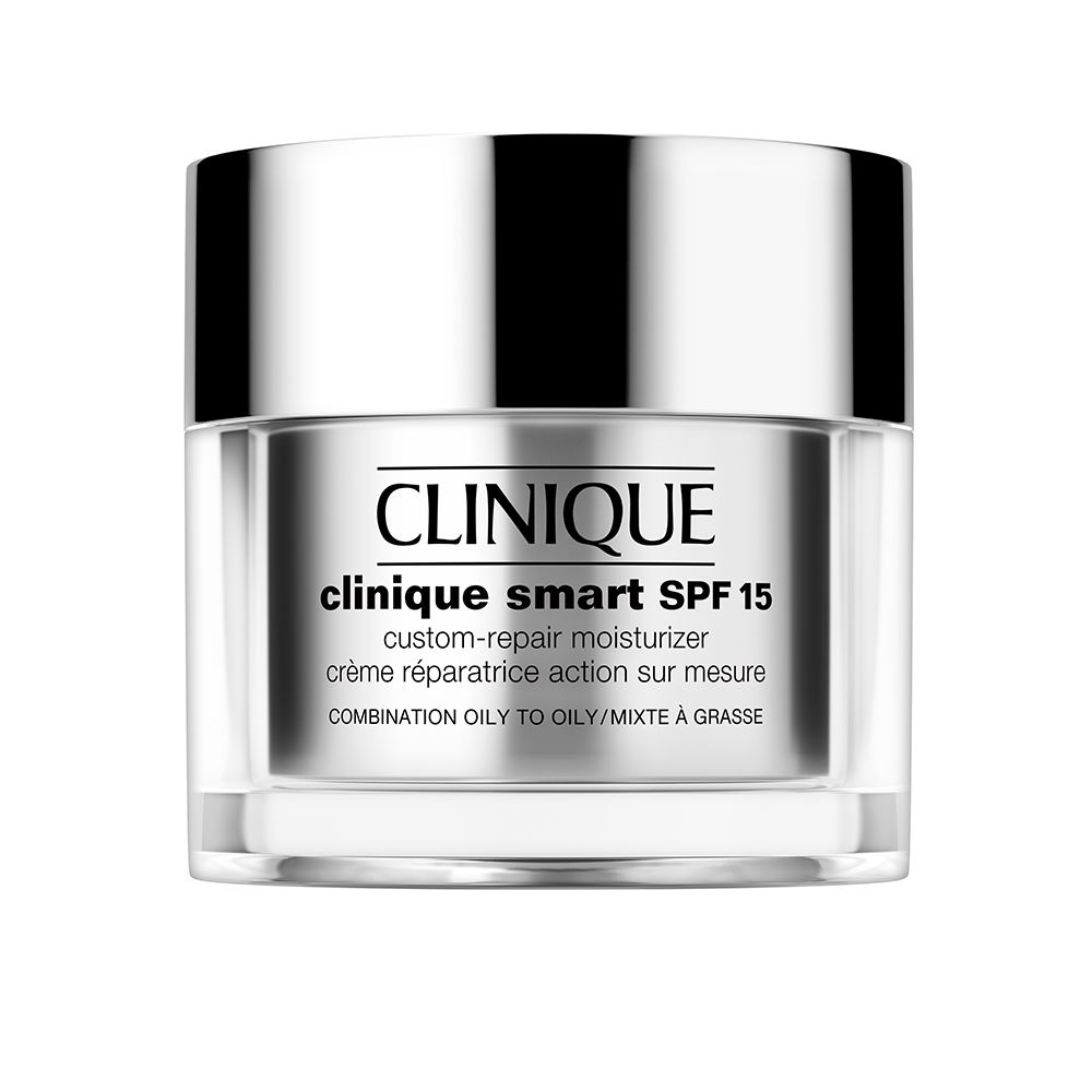 Pot de crème avec couvercle. Inscription : CLINIQUE, smart SPF 15. Texte : custom-repair moisturizer. Pour peaux grasses.