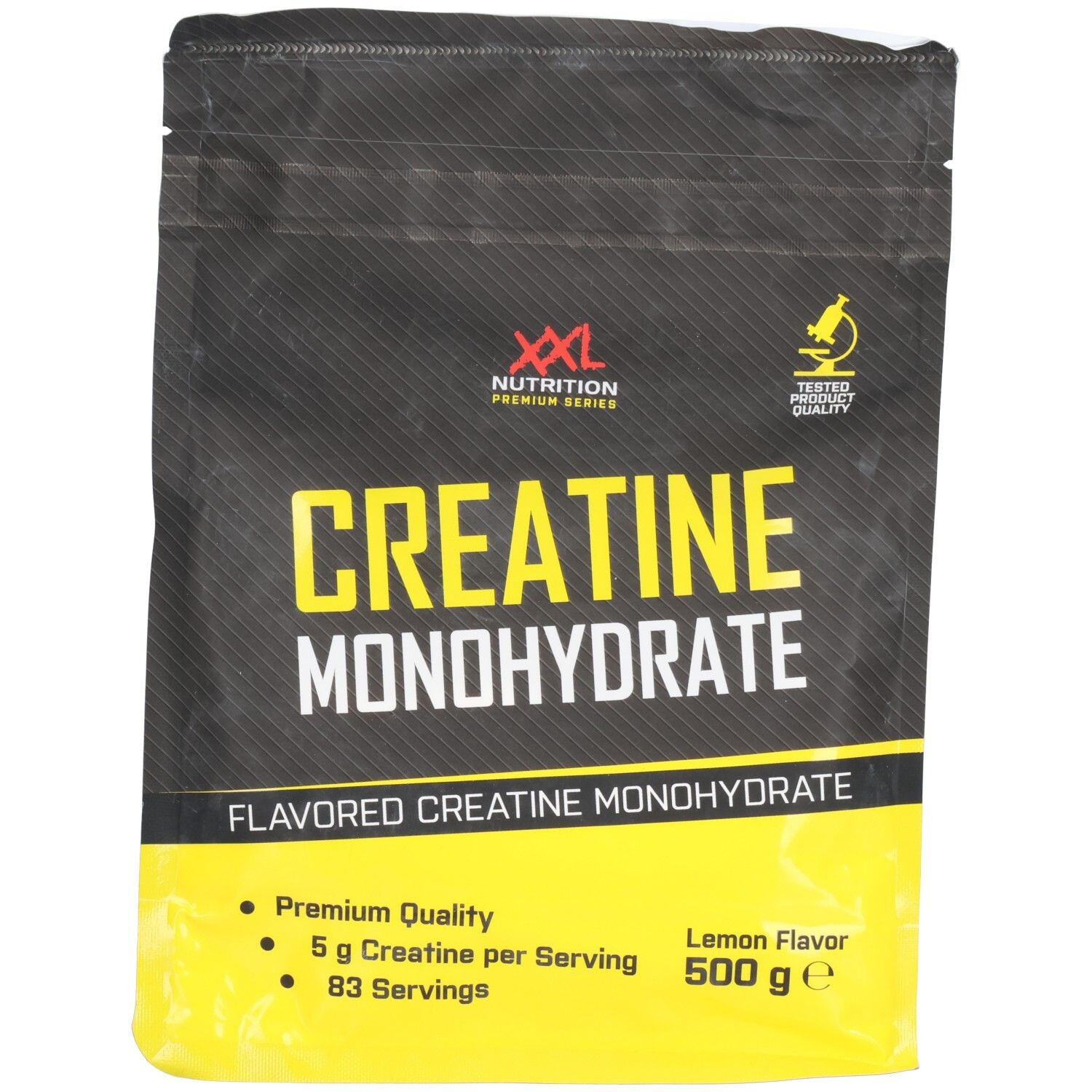 Emballage noir avec texte jaune. 'Creatine Monohydrate' et 'XXL Nutrition' visibles. 500 g, goût citron.