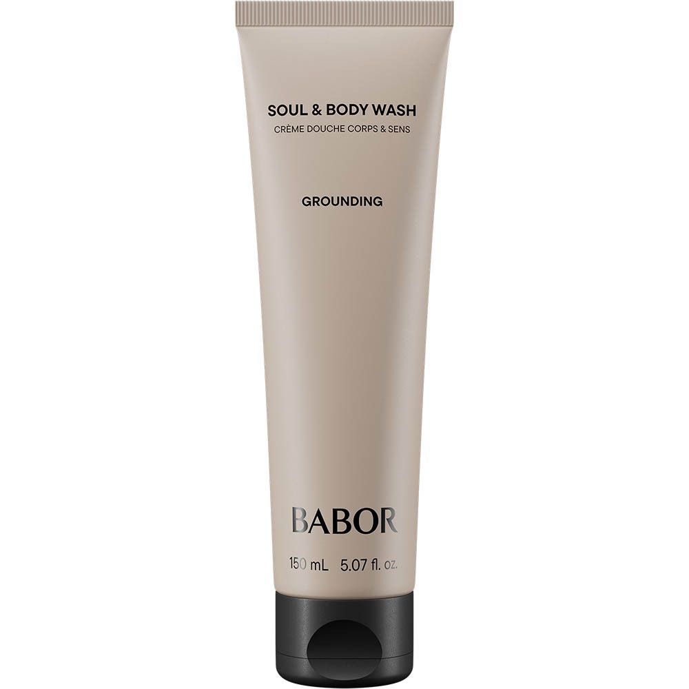 Tube beige avec bouchon noir. Inscription: Soul & Body Wash, Grounding, Babor. En bas: 150 ml, 5.07 fl. oz.
