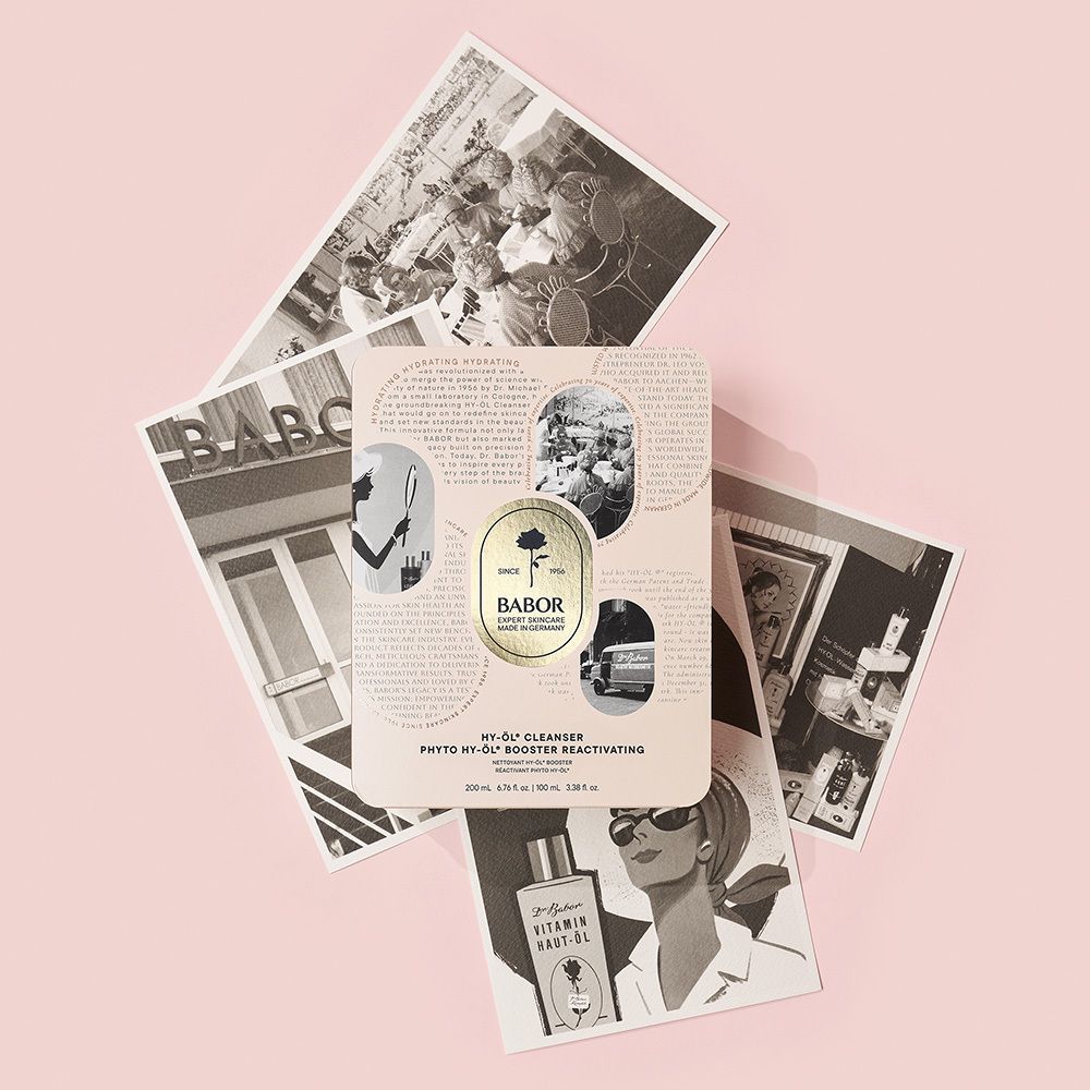 Boîte dorée rose avec deux flacons. Marque BABOR. Sur fond rose.