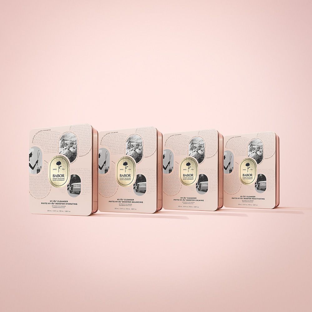 Plusieurs boîtes métalliques côte à côte. Logo rose et texte BABOR. Texte : HY-ÖL® Cleanser, Phyto HY-ÖL® Booster Balancing.
