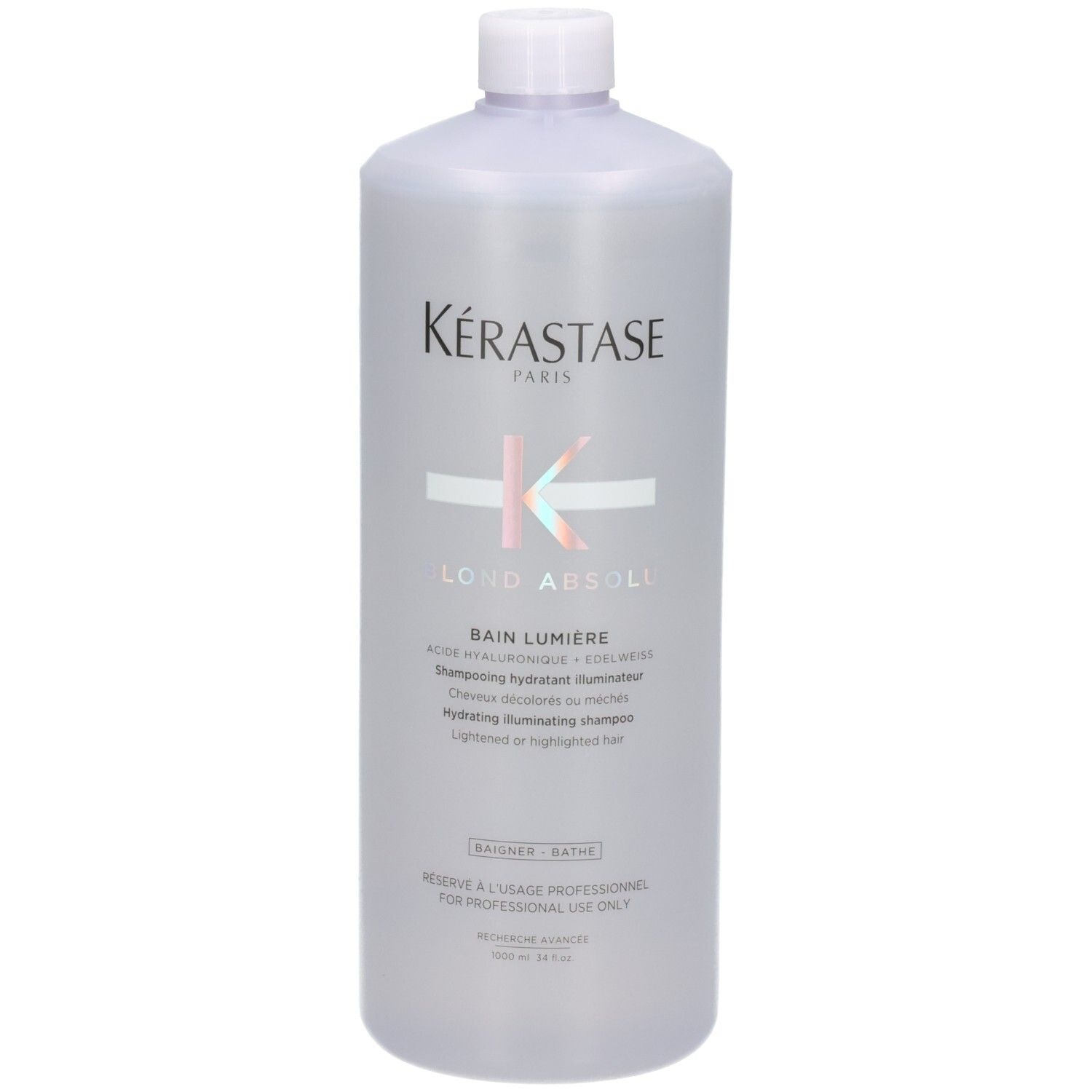 Bouteille Kérastase Bain Lumière avec bouchon blanc. Shampooing hydratant pour cheveux clairs ou méchés.