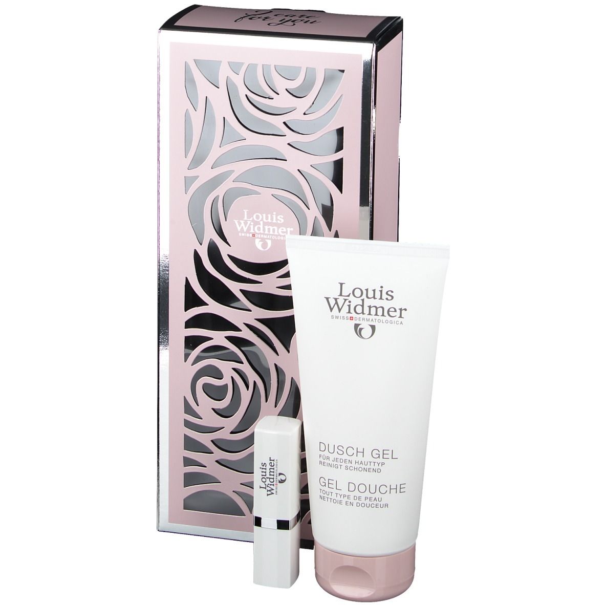 Coffret cadeau Louis Widmer avec gel douche et stick à lèvres. Emballage avec motif de roses et logo. Tube de gel douche blanc et stick à lèvres.