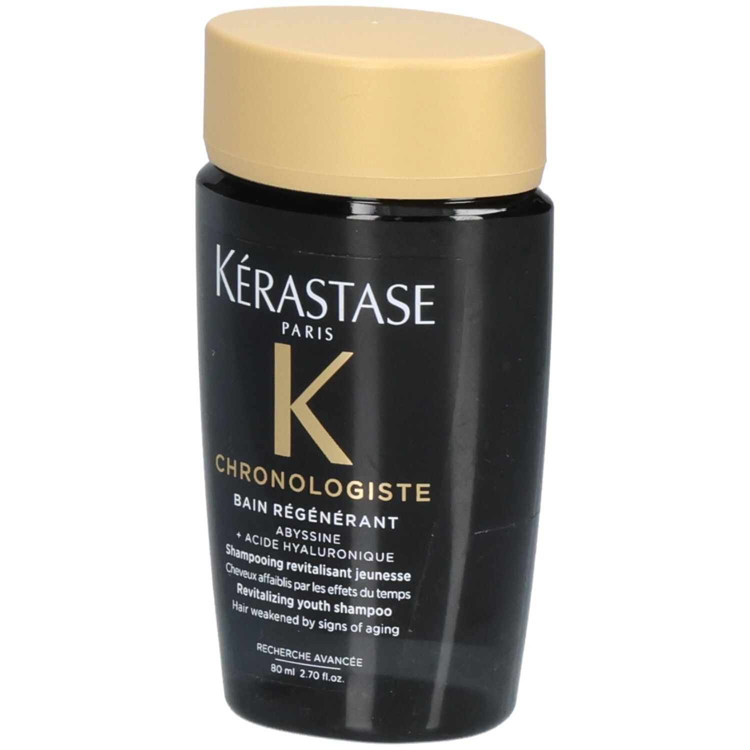 Kérastase Chronologiste Bain Régénérant shampooing jeunesse revitalisant dans un flacon noir avec un bouchon doré.
