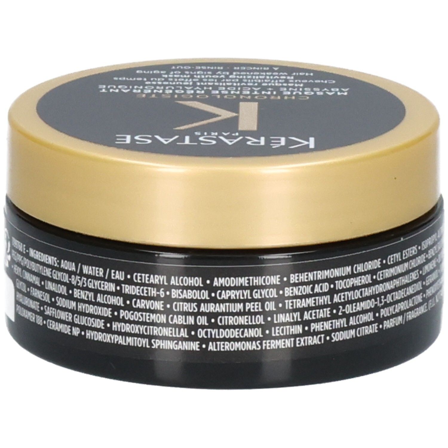 Masque Kérastase Chronologiste, pot noir avec couvercle doré, étiquette avec ingrédients et instructions d'utilisation.