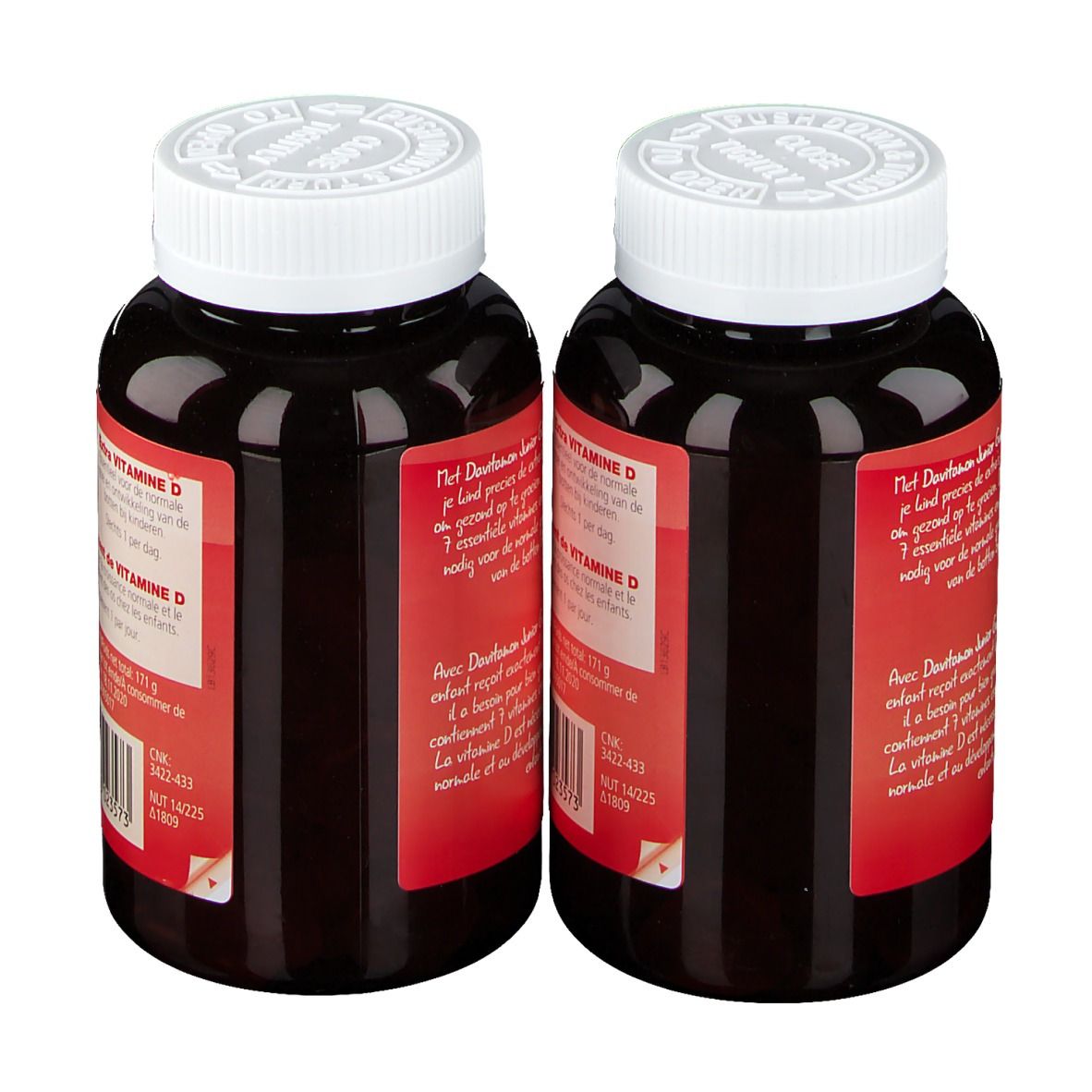 Deux flacons de Davitamon Junior Gummies. Étiquettes rouges, couvercles blancs. Inscription : Junior Gummies, Multivitamines.