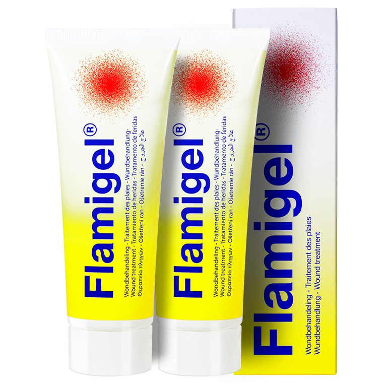 Deux tubes Flamigel, jaune et blanc, avec motif point rouge. Emballage avec nom du produit.