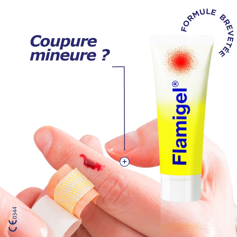 Tube Flamigel, jaune et blanc, point rouge. Doigt avec petite coupure.