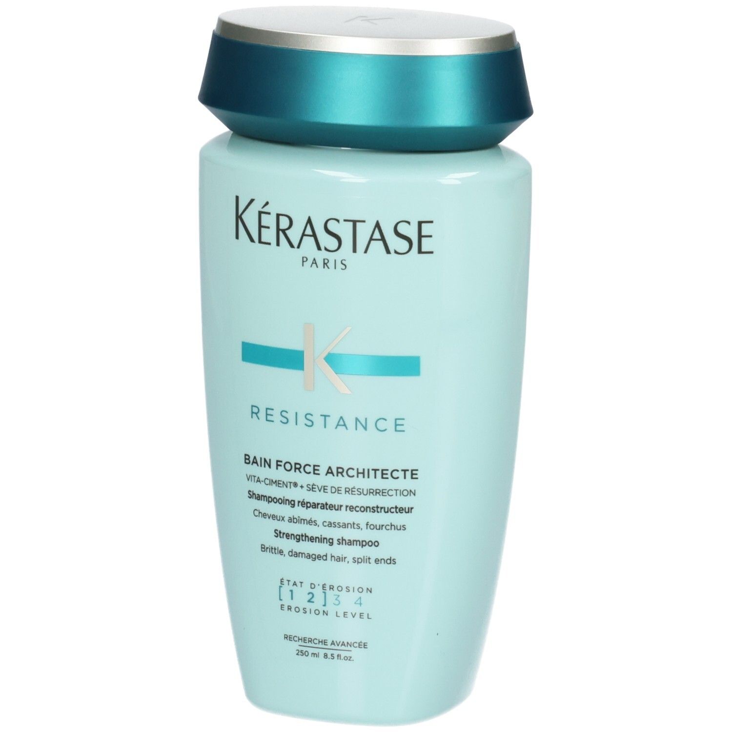 Bouteille Kérastase bleu clair avec bouchon turquoise. Shampooing fortifiant pour cheveux abîmés.