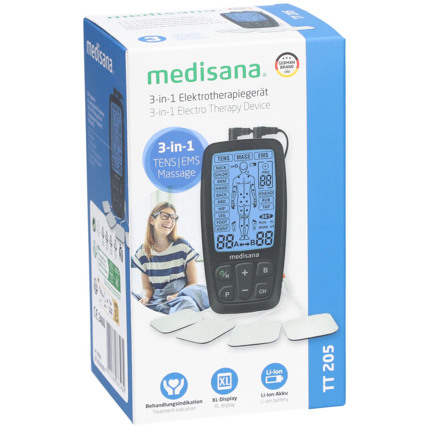 Face avant de l'emballage de l'appareil d'électrothérapie. Appareil, coussinets, écran, boutons. Marque : medisana. Appareil 3 en 1. Produit : TT 205. Écran XL, batterie Li-Ion.