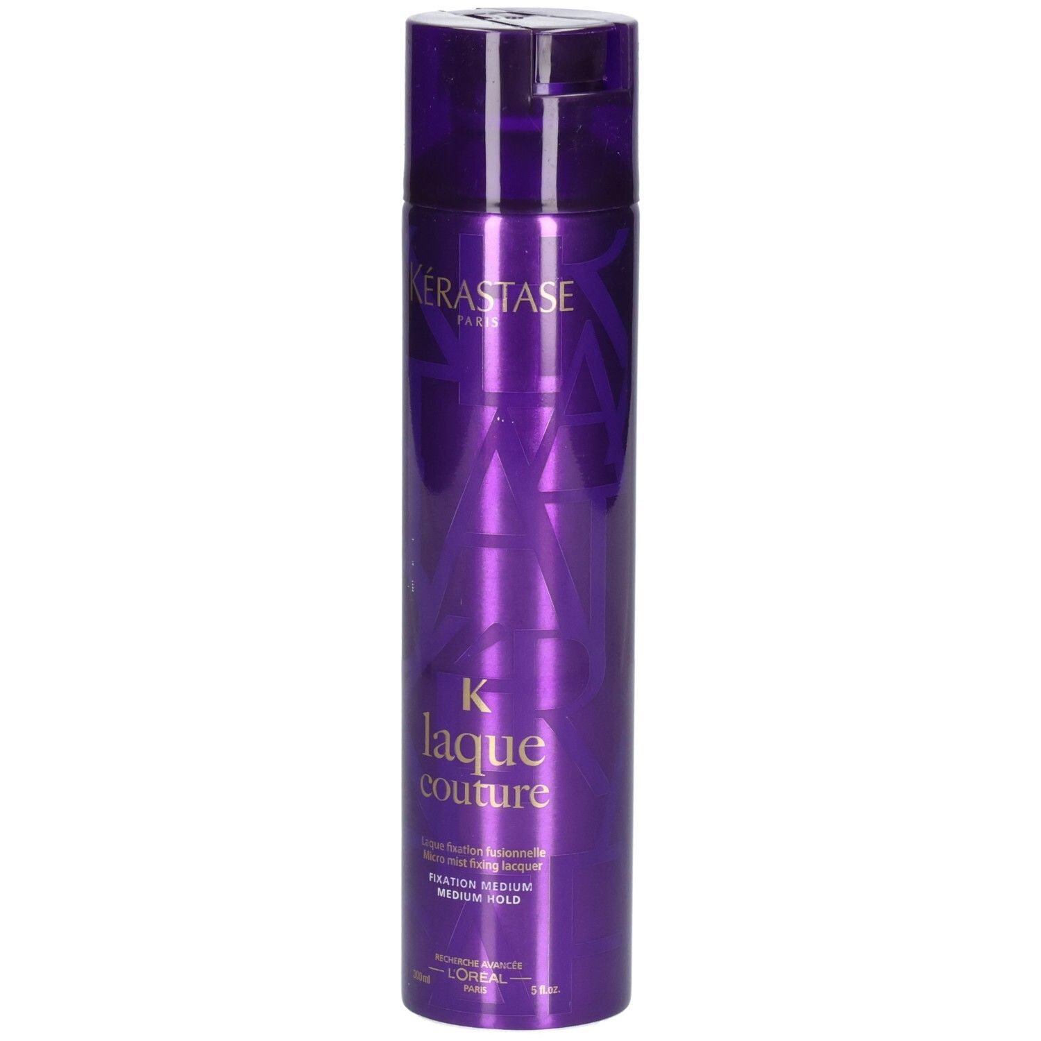 Laque Kérastase Laque Couture, flacon violet avec inscription dorée, fixation moyenne.