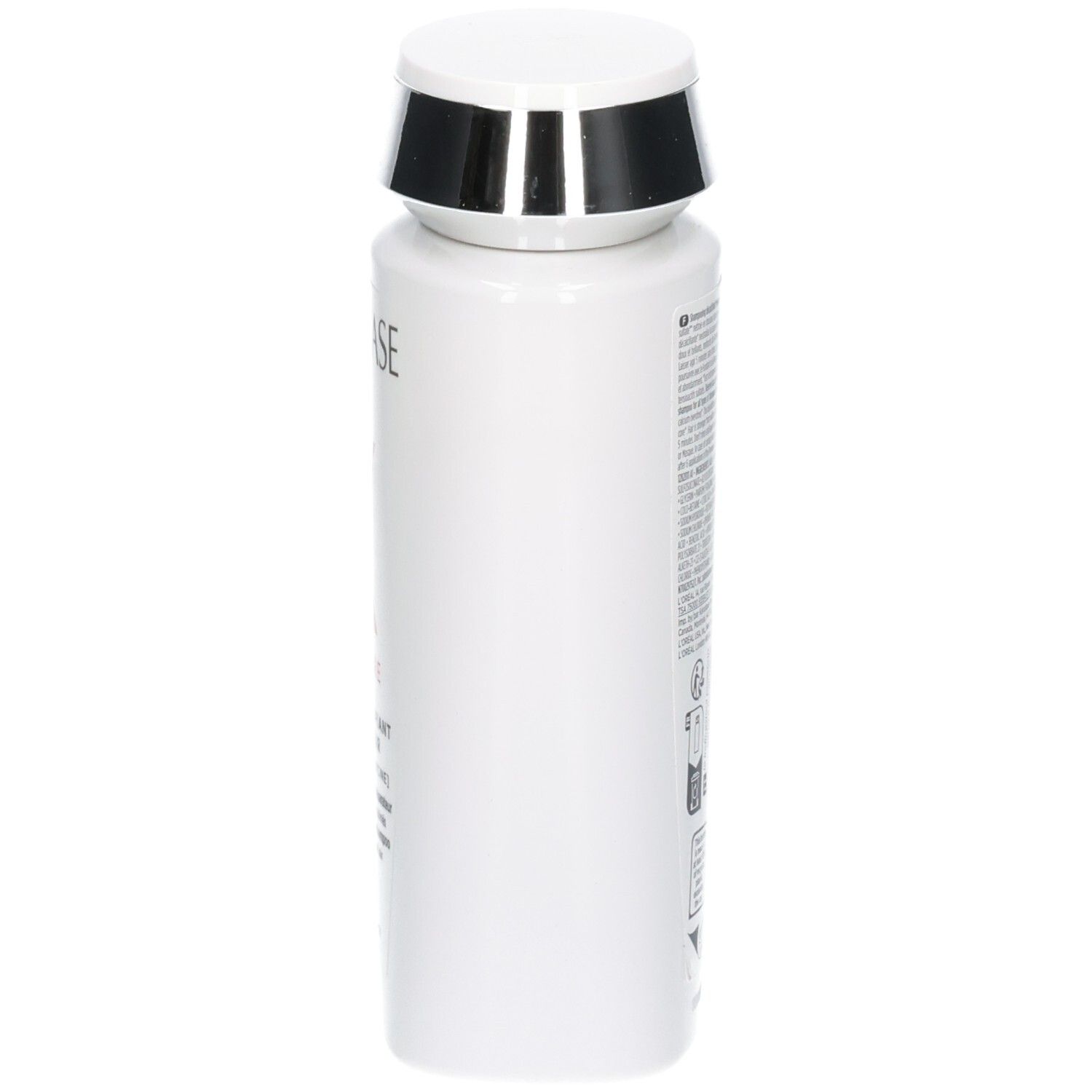Bouteille de shampooing Kérastase Première, vue de côté avec étiquetage.