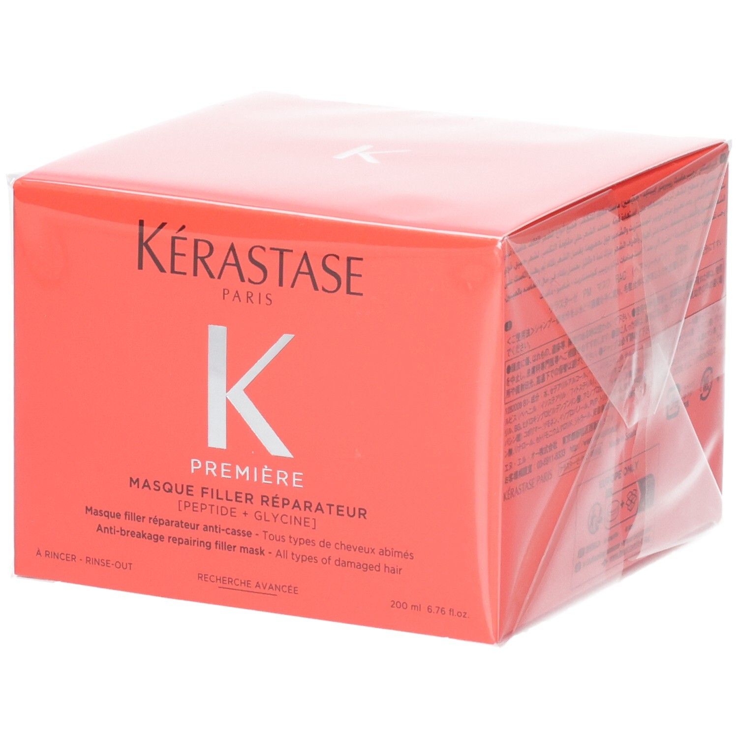 Kérastase Première Masque Filler Réparateur soin capillaire dans un emballage orange.