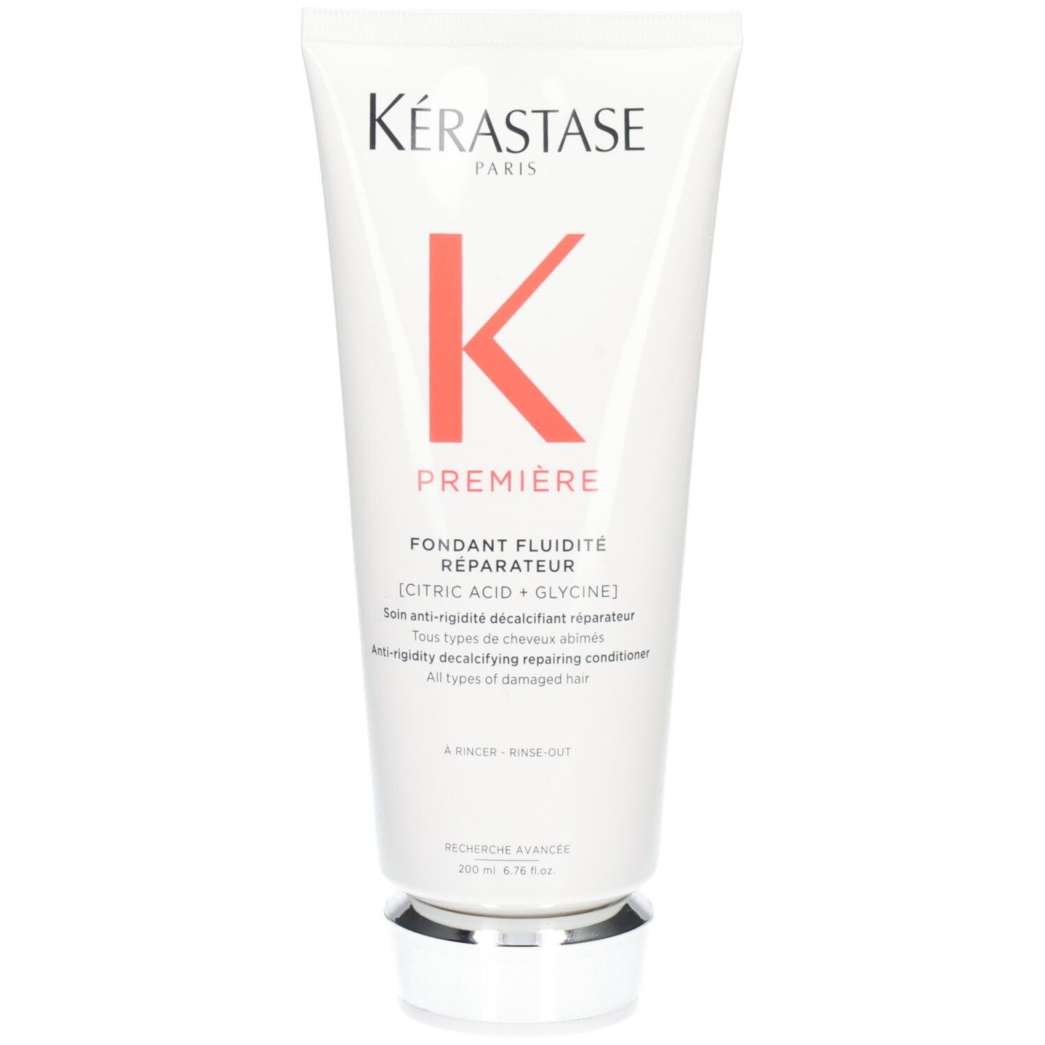 Tube Kérastase Première Fondant Fluidité Réparateur avec logo K. Contient de l'acide citrique + glycine.