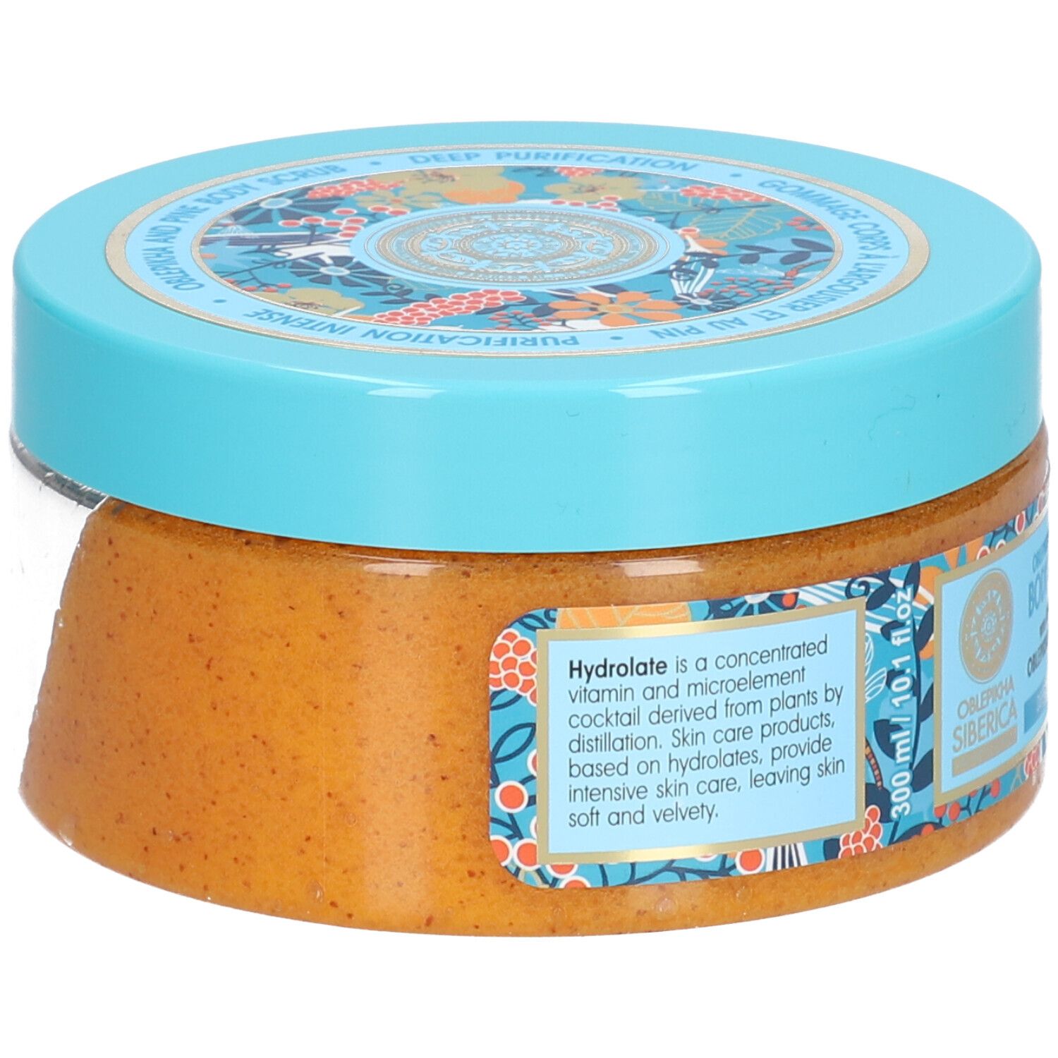 Pot rond avec couvercle bleu. Inscription: Oblepikha and Pine Body Scrub. Label Vegan. 300 ml.