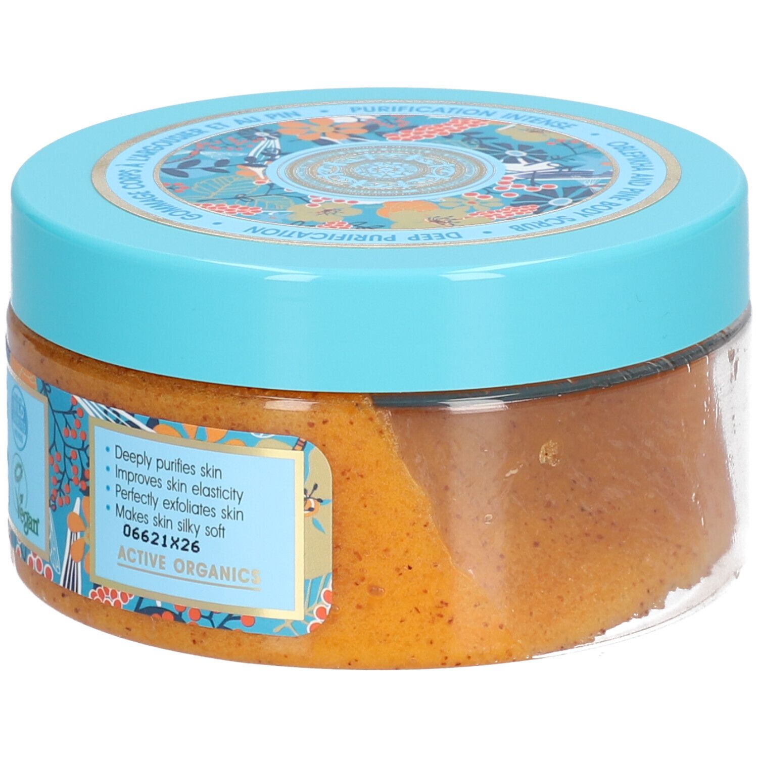 Pot rond avec couvercle bleu. Inscription: Oblepikha and Pine Body Scrub. Label Vegan. 300 ml.