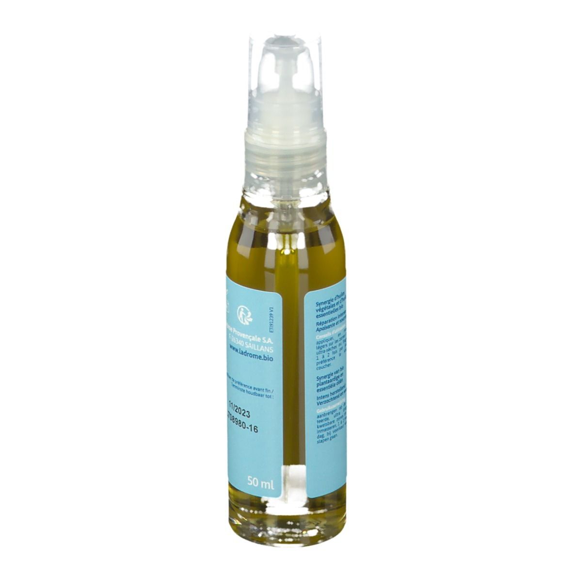 Dos du flacon d'huile avec étiquette bleu clair. Texte et logo. Certification bio. Date de péremption.