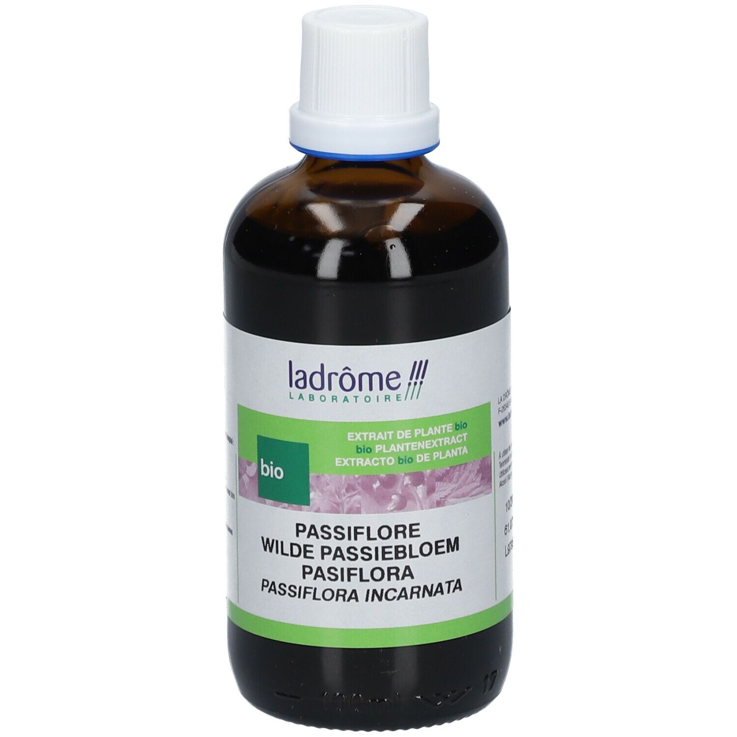 Flacon en verre brun avec bouchon blanc. Étiquette avec informations et label bio.