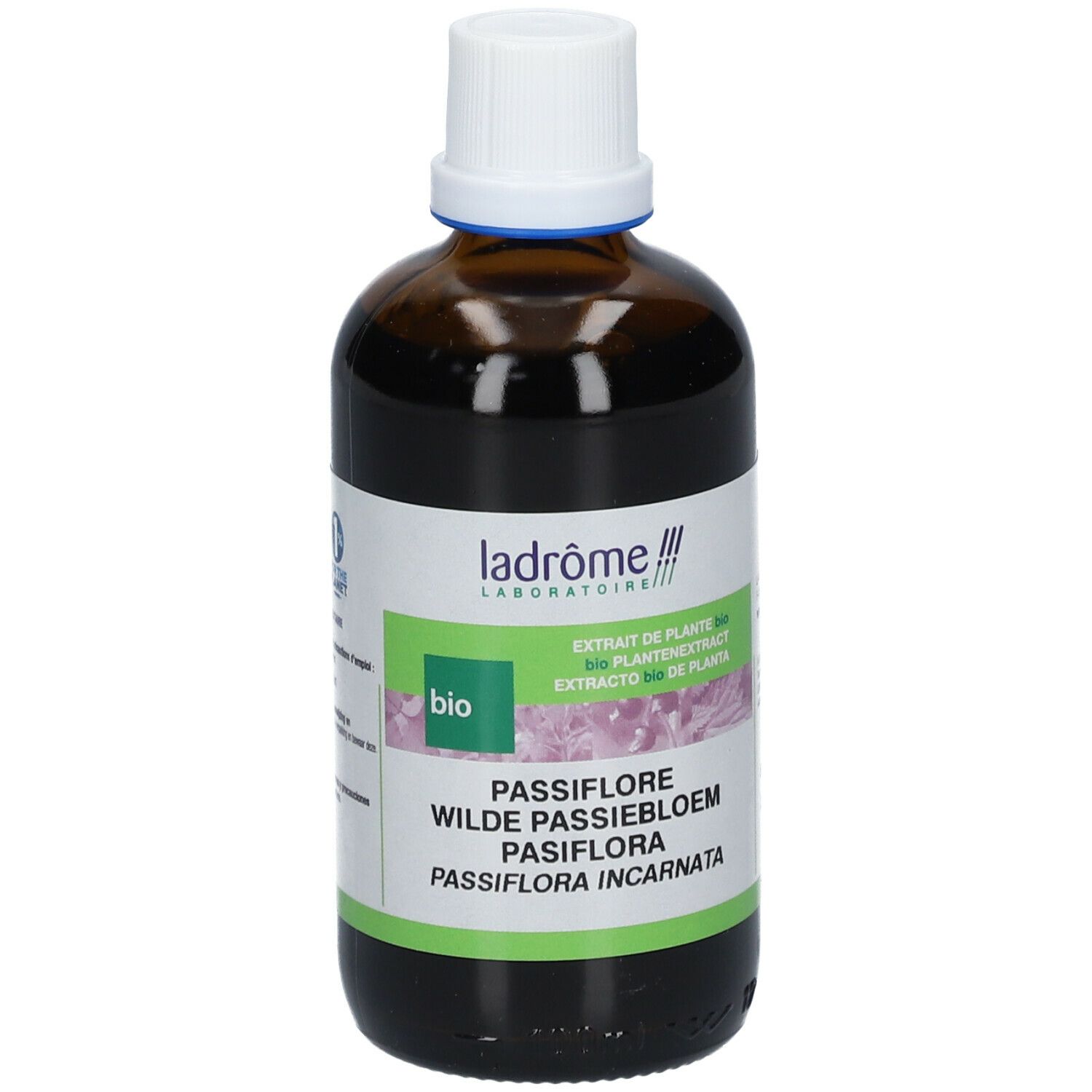 Flacon en verre brun avec bouchon blanc. Étiquette avec nom, label bio et informations.