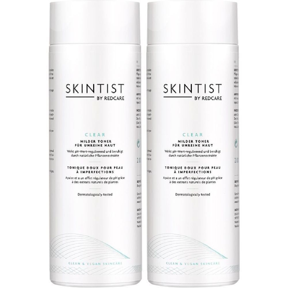 Deux flacons blancs de lotion tonique légère SKINTIST CLEAR. Inscription : Tonique doux pour peaux à imperfections.