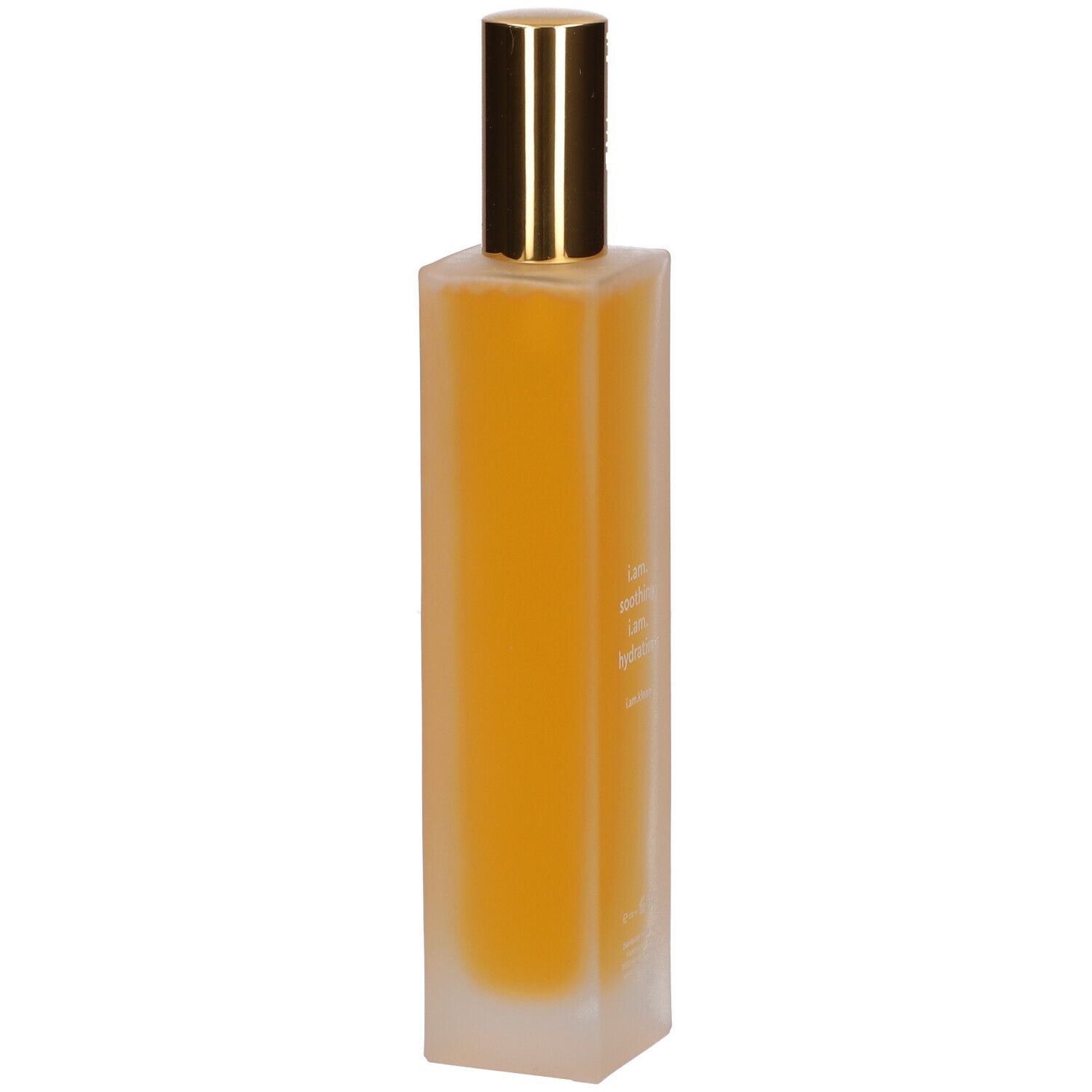 Flacon cylindrique avec vaporisateur doré. Inscription : i.am, soothing, hydrating. Liquide jaune visible.