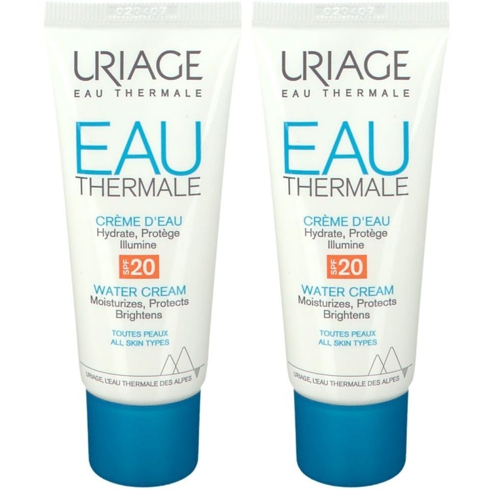 Deux tubes de Uriage Eau Thermale Crème d'Eau SPF20. Tubes blancs avec bouchon bleu. Texte: Eau Thermale, Crème d'Eau, SPF20, Water Cream.