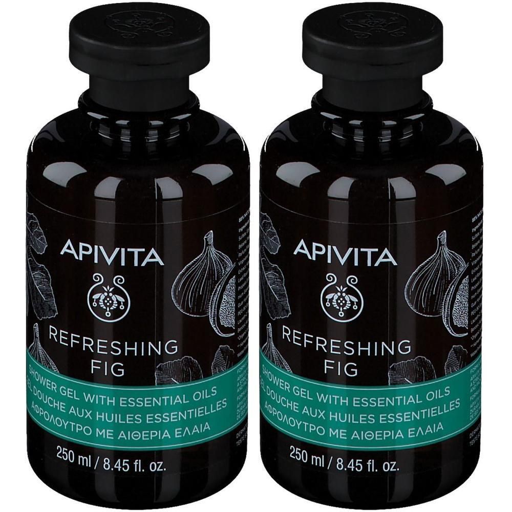 Deux flacons de gel douche avec bouchon noir. Inscription: APIVITA, REFRESHING FIG. Illustration d'une figue. Texte multilingue.