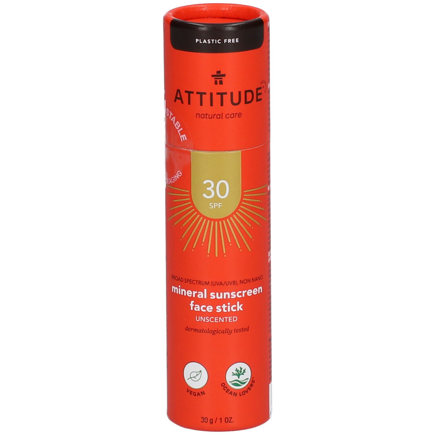Emballage cylindrique orange. Logo "ATTITUDE", "SPF 30" et "mineral sunscreen face stick" visibles. Inscription "PLASTIC FREE".