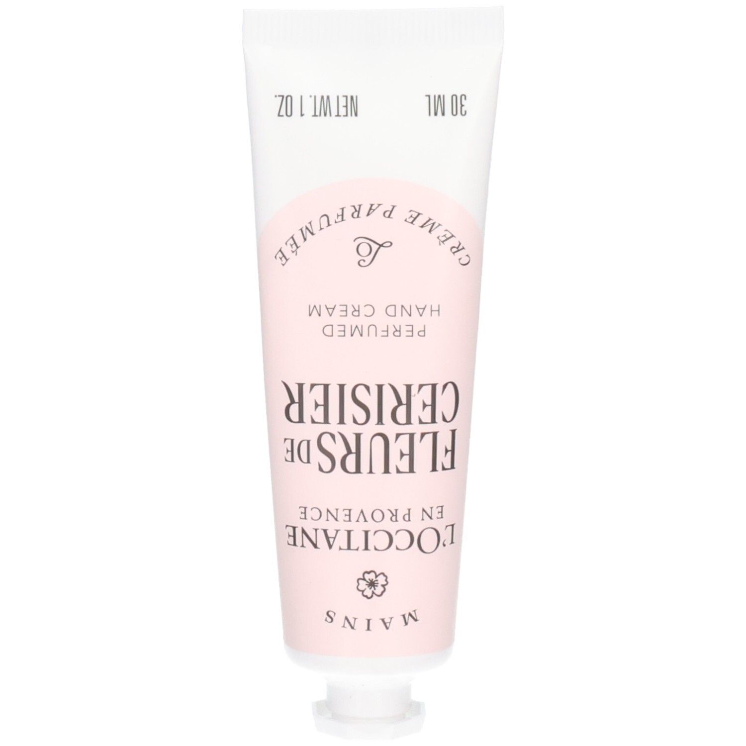 Tube de crème pour les mains L'OCCITANE, motif fleur de cerisier.