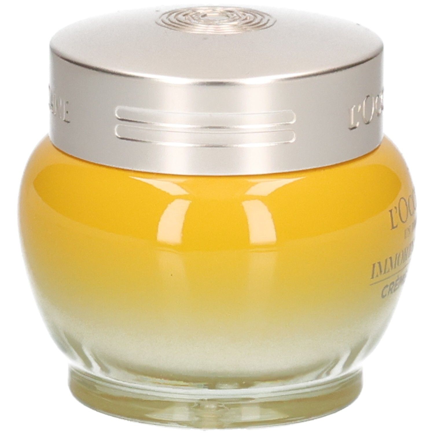 L'OCCITANE Immortelle Divine Crème Jeunesse dans un pot en verre jaune avec un couvercle argenté.