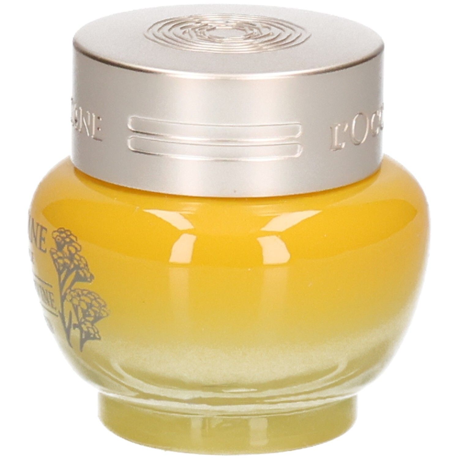 L'OCCITANE Baume Regard Immortelle Divine, vue de trois quarts avant, pot jaune avec couvercle argenté.