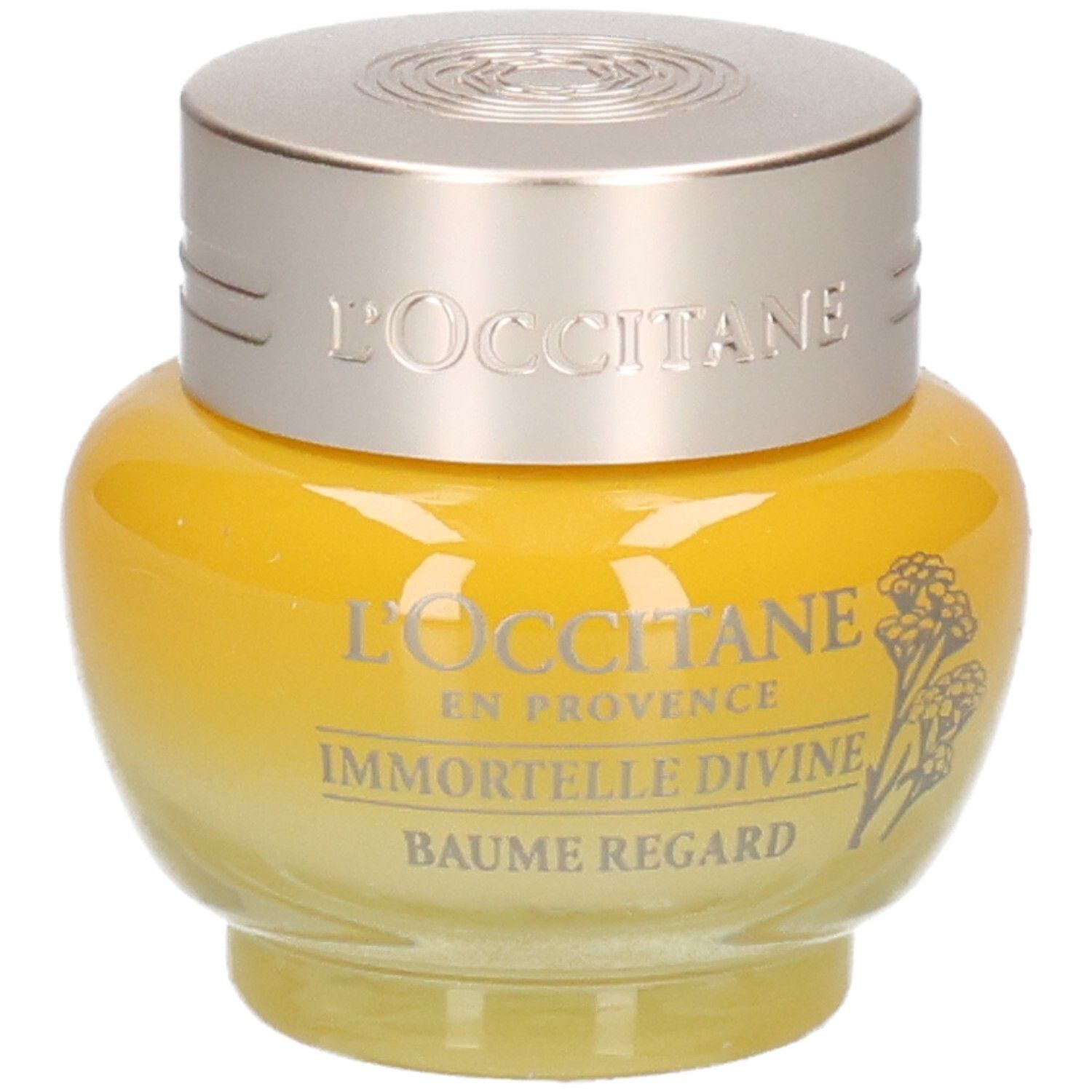 L'OCCITANE Baume Regard Immortelle Divine, pot jaune avec couvercle argenté, légèrement incliné.