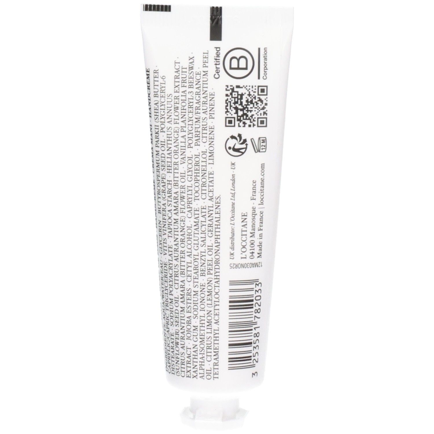 Arrière d'un tube blanc avec ingrédients et certifications pour Crème Mains L'Occitane.