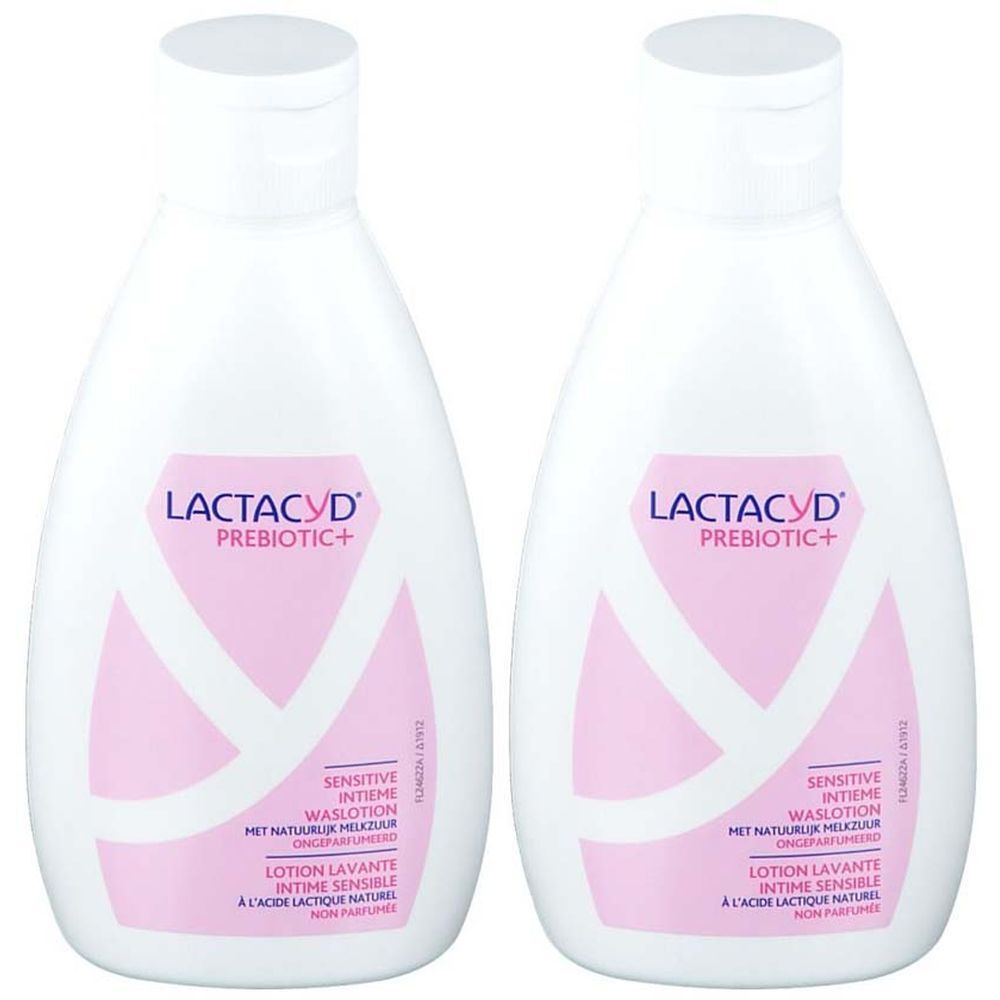 Deux flacons blancs avec des étiquettes roses. Les étiquettes indiquent "LACTACYD PREBIOTIC+" et d'autres informations sur le produit.