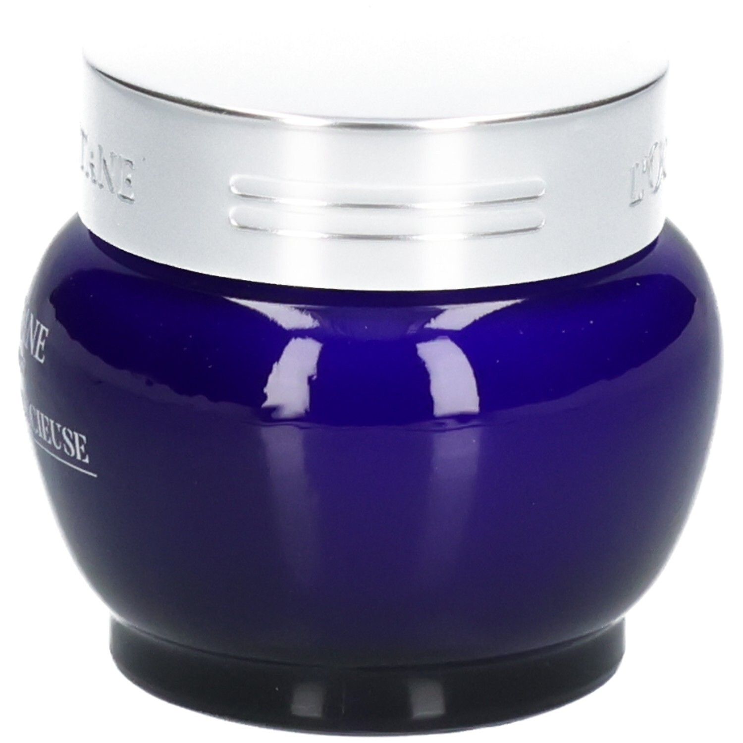 L'OCCITANE Immortelle Précieuse Crème dans un pot en verre bleu avec un couvercle argenté.