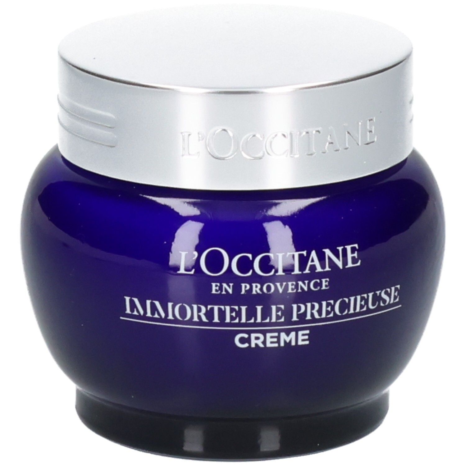 L'OCCITANE Immortelle Précieuse Crème dans un pot en verre bleu avec un couvercle argenté.