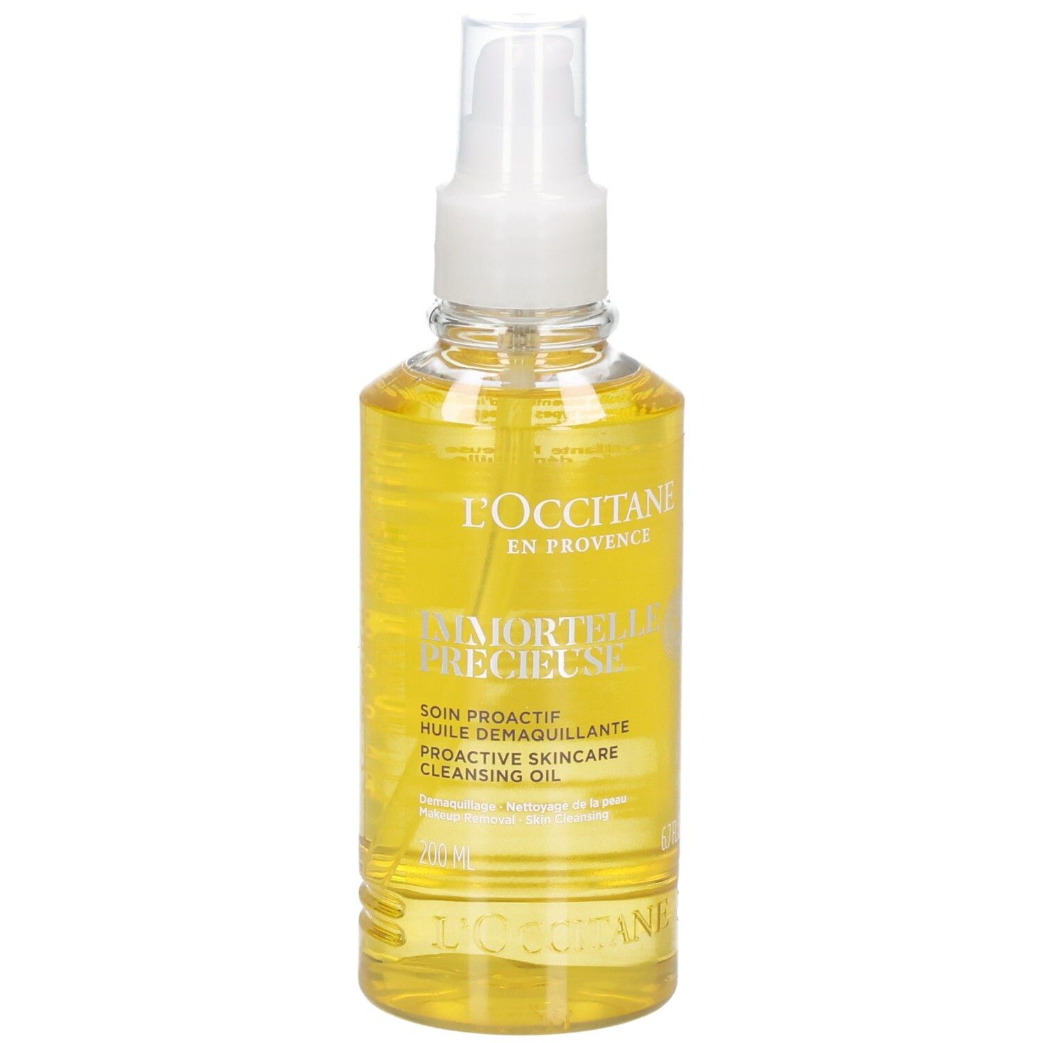 Huile démaquillante L'OCCITANE Immortelle dans un flacon pulvérisateur transparent avec une huile jaune.