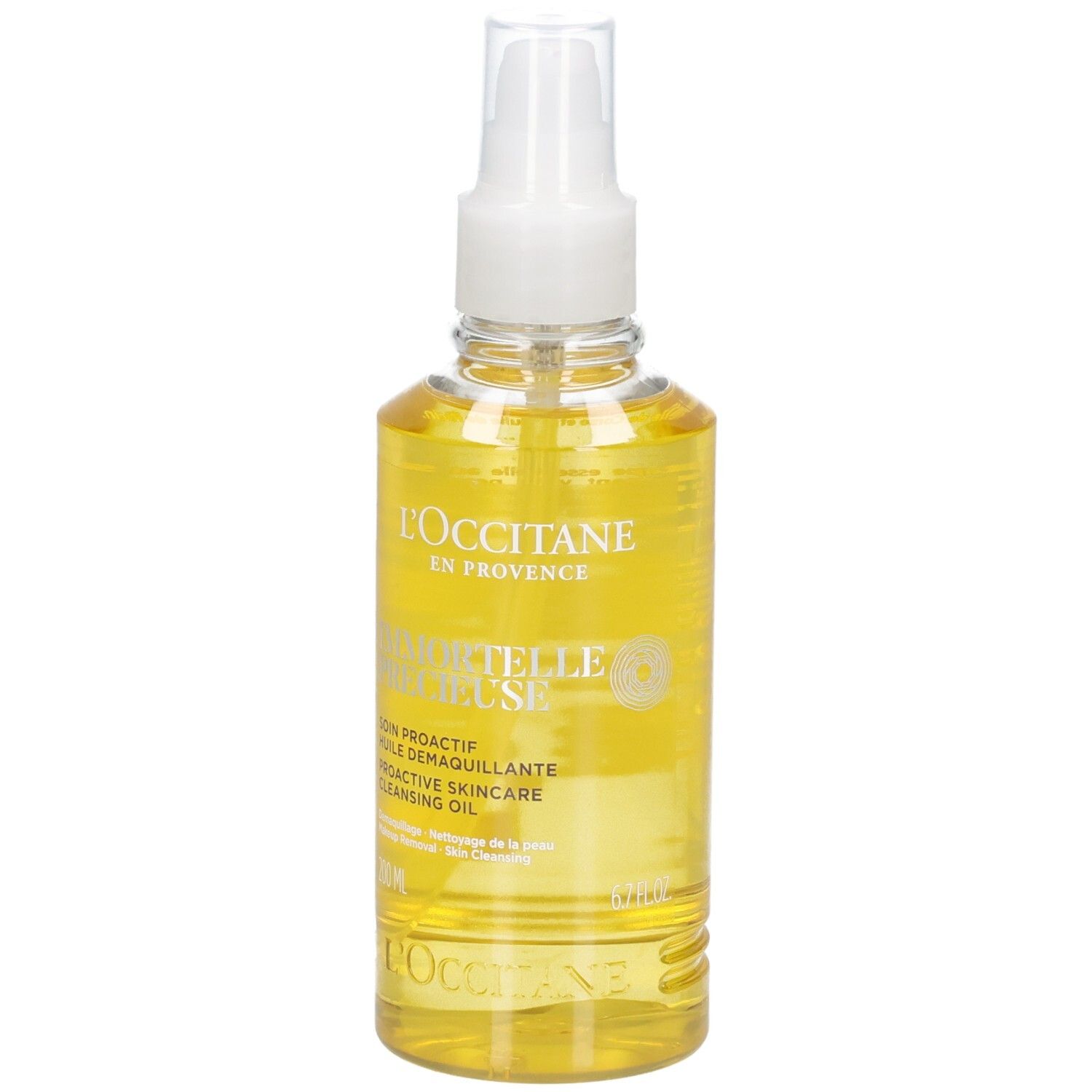 Huile démaquillante L'OCCITANE Immortelle dans un flacon pulvérisateur transparent avec une huile jaune.