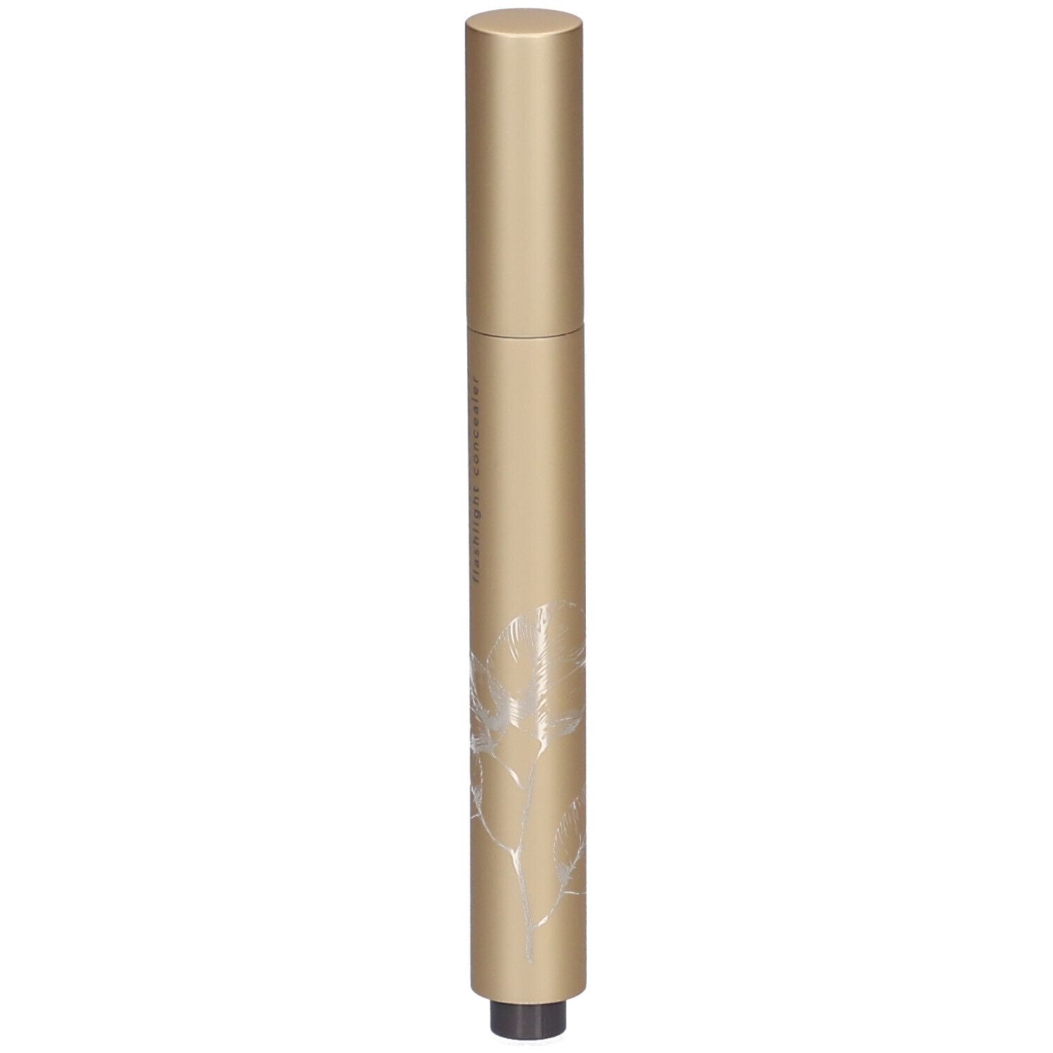 Stylo correcteur doré avec pointe noire. Inscription et décor floral sur le stylo.