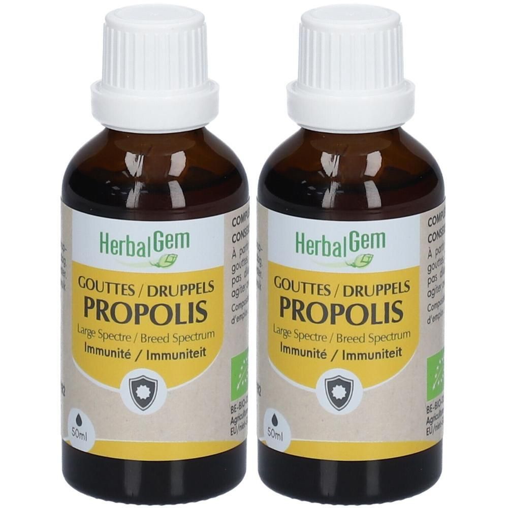 Deux flacons bruns avec bouchons blancs. Étiquettes "HerbalGem PROPOLIS". Certification bio et symbole de goutte.