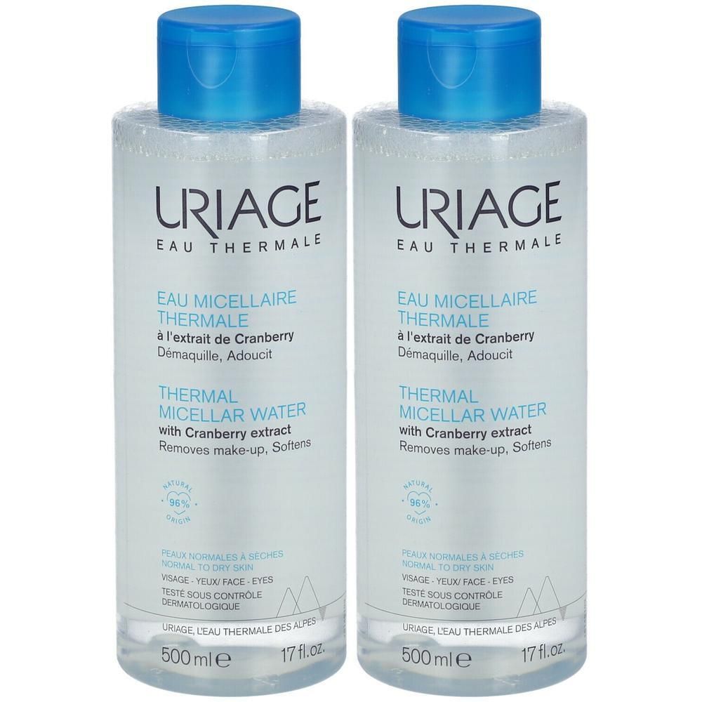 Deux flacons de URIAGE Eau micellaire Thermale. Bouchons bleus, flacons transparents avec étiquettes. Texte: Thermal Micellar Water.