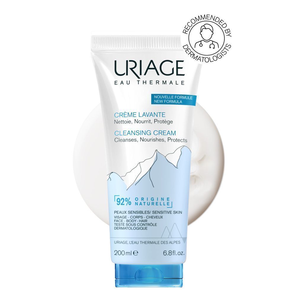 Dos du tube de Crème Lavante Uriage. Texte multilingue. Développé avec des dermatologues. Coloris bleu et blanc.