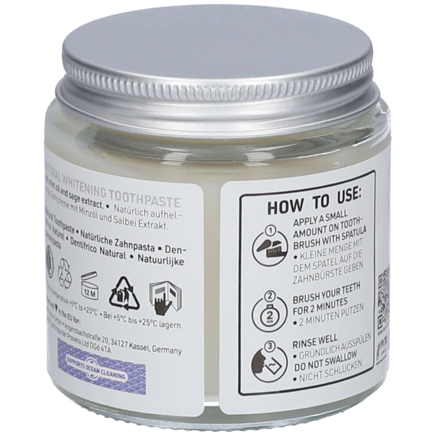 Dos du pot de dentifrice. Étiquette avec informations sur le produit, ingrédients et certifications.