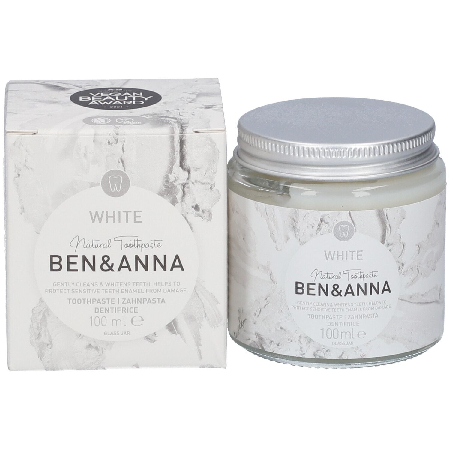 Pot de dentifrice et boîte en carton. Les deux avec informations et logo de la marque. Vegan Beauty Award.